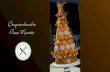 Croquembouche Piece Montée · Croquembouche (piece montée) is a traditional French dessert; a tower of profiteroles; choux pastry puffs filled with vanilla pastry cream and coated