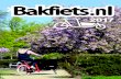 Bakfiets folder 2017...bench and a baby in a Maxi Cosy or white woolly baby/toddler seat in the front area. You can also carry a dog with a top cage or add a door in the side of the